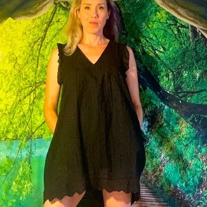 Black polyester shorts jumper in perfect condition.  Size medium